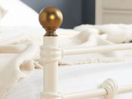 Closeup of white single bed by Birlea